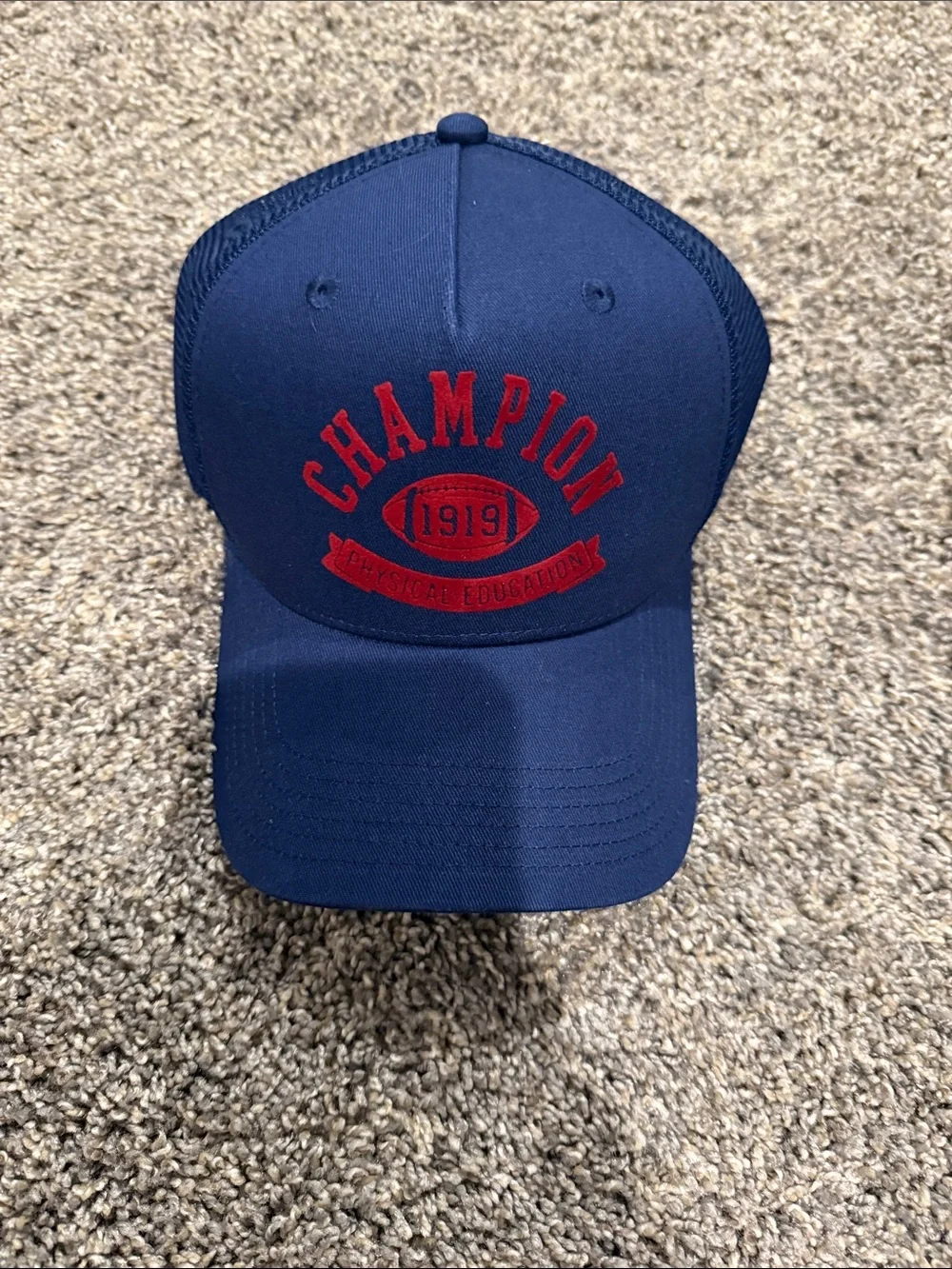 Champion Navy Blue Trucker Hat with Red Embroidered Logo